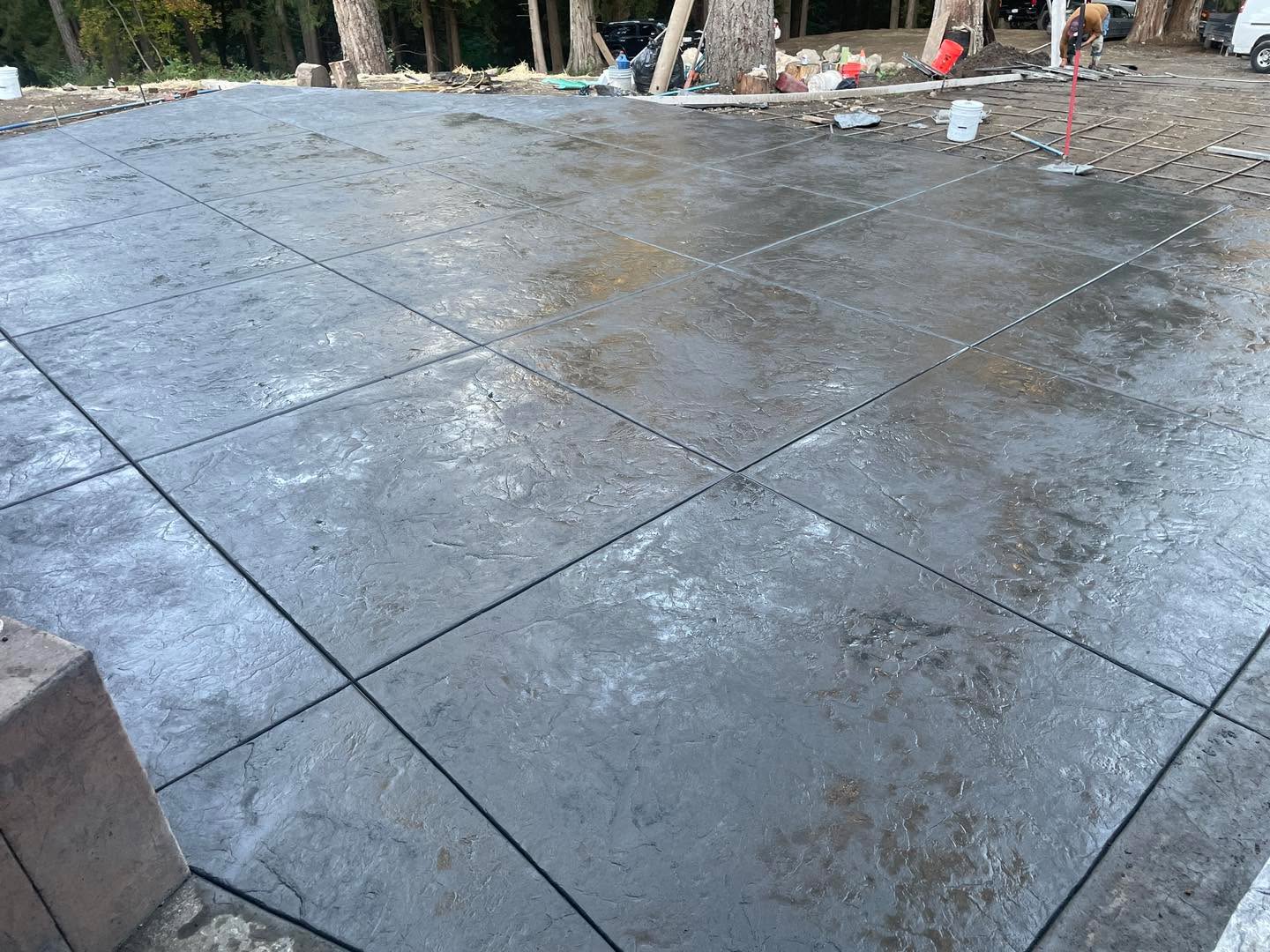 Seamless stamp concrete driveway with control joints by A&Z Services